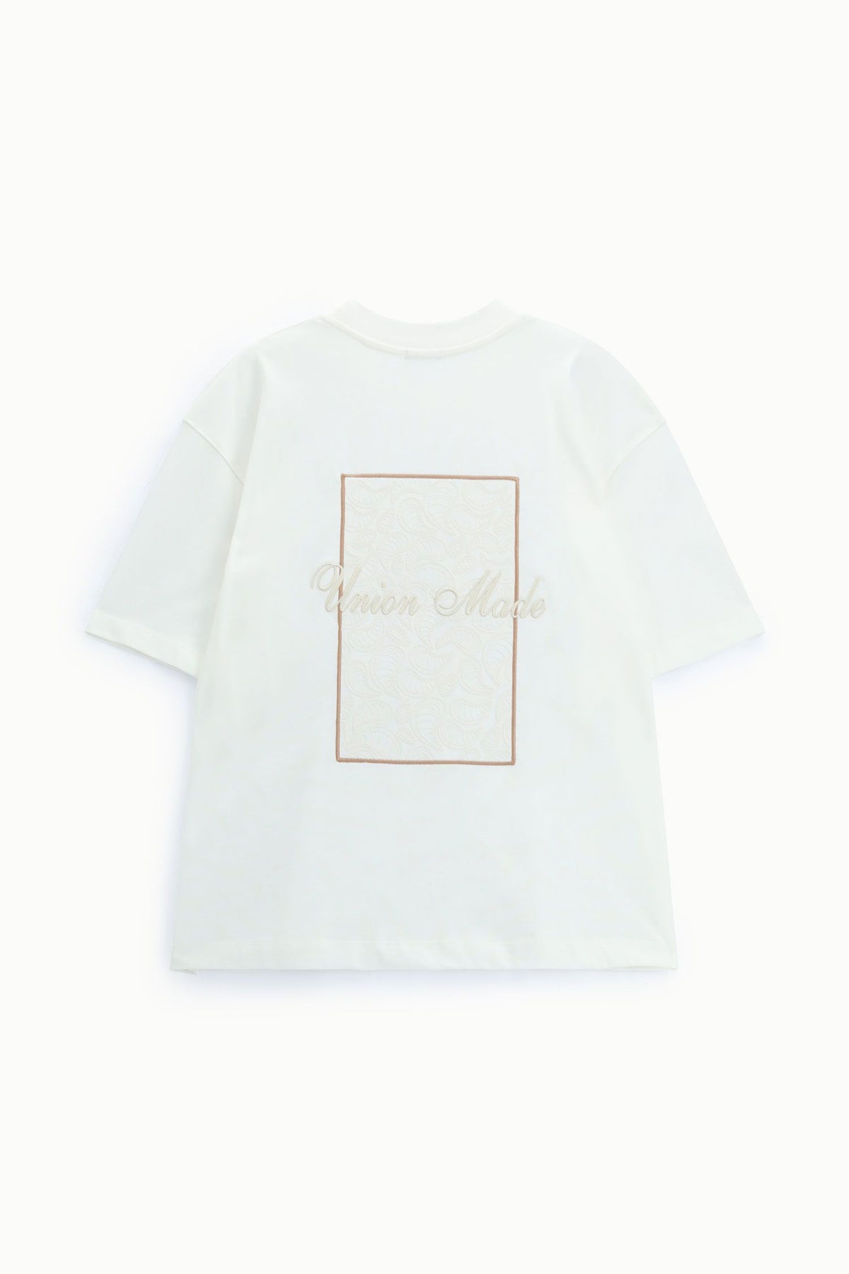 T-shirt bianca over con ricami