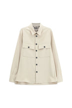 Camicia beige con tasche