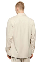 Camicia beige con tasche