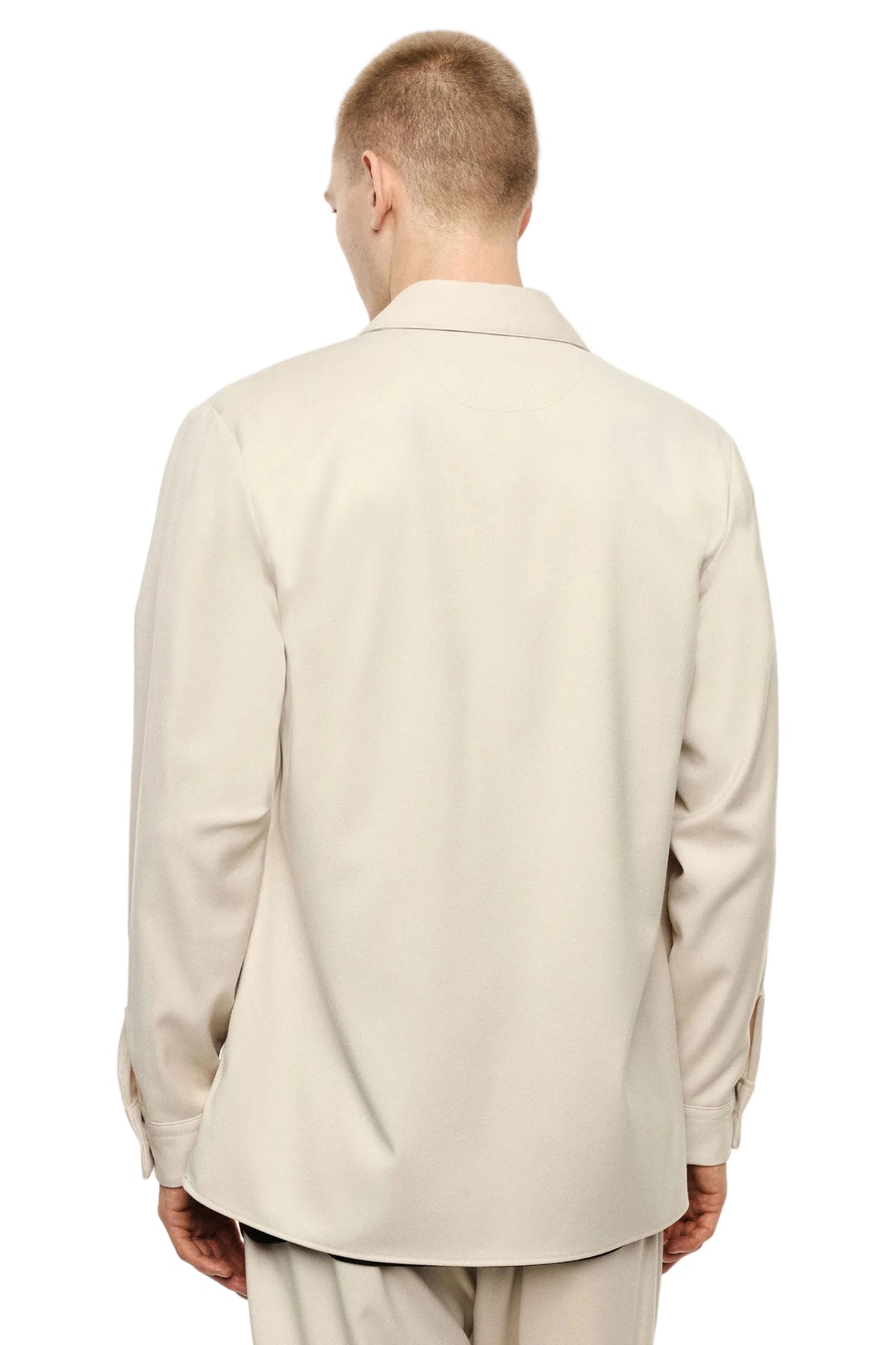 Camicia beige con tasche