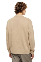 Maglione beige con rotture