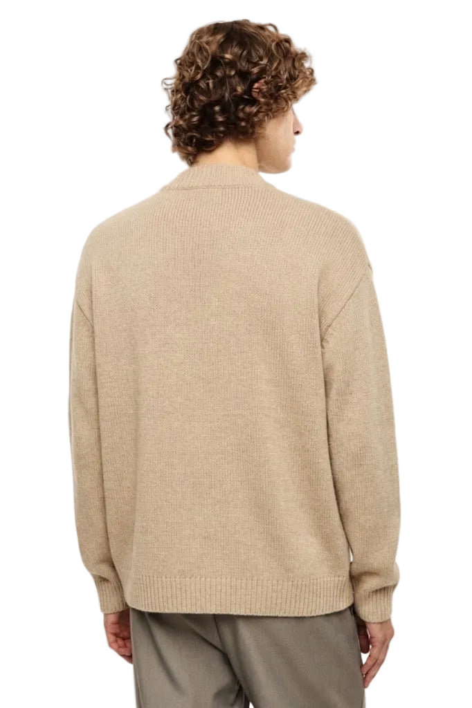 Maglione beige con rotture