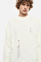 Maglione panna con rotture
