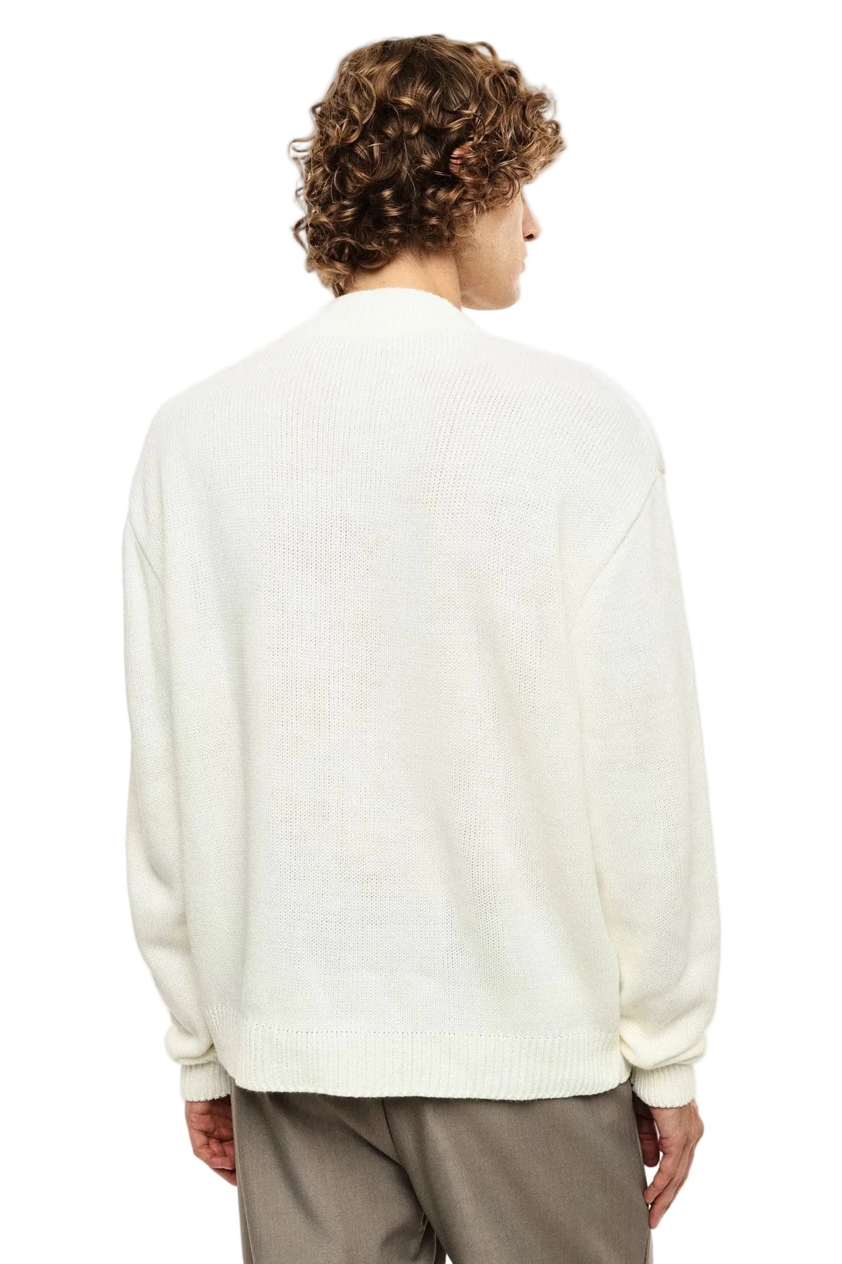 Maglione panna con rotture