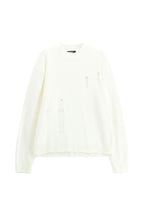 Maglione panna con rotture