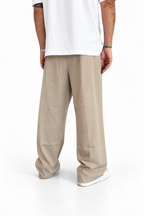 Pantalaccio beige con pences a fondo ampio