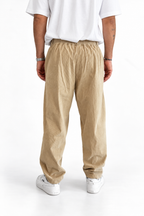 Pantalone costine beige fono largo