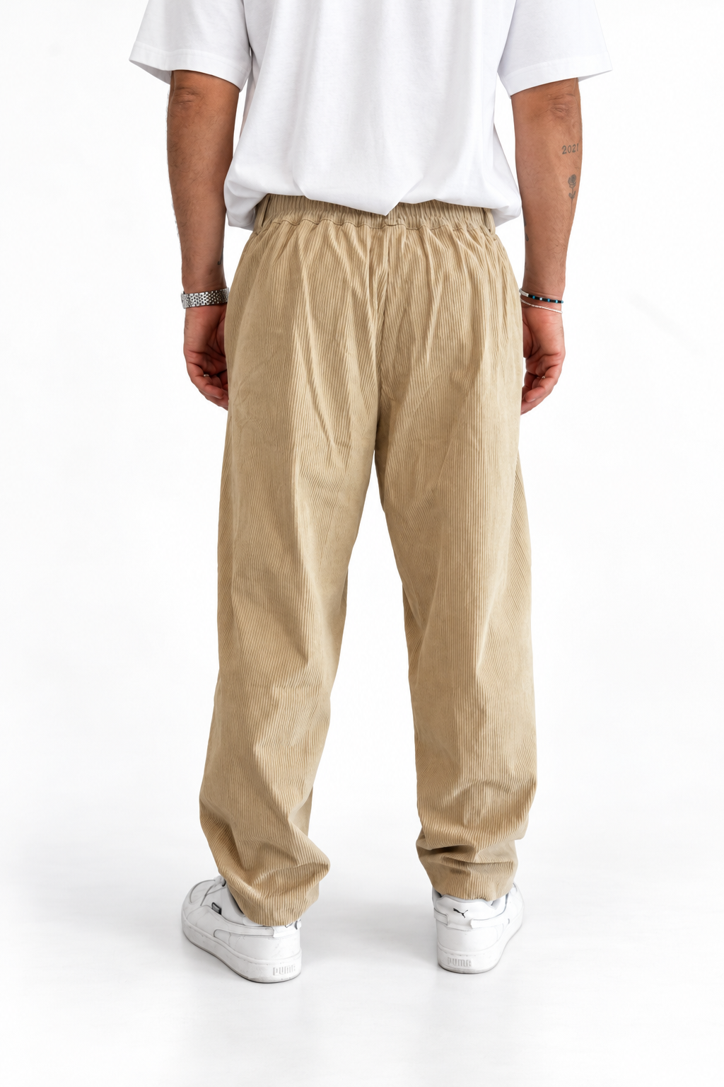 Pantalone costine beige fono largo